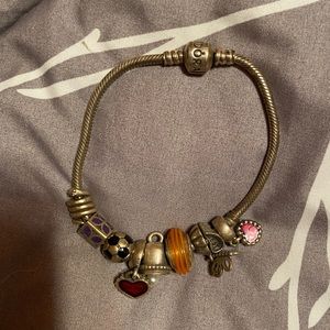 Pandora bracelet with charms.